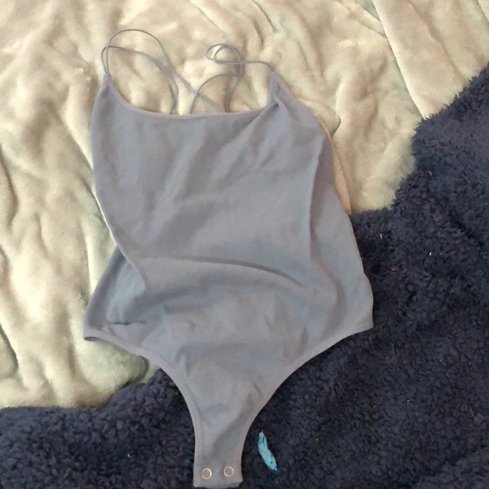 Body suit with open back size medium, button up bottoms